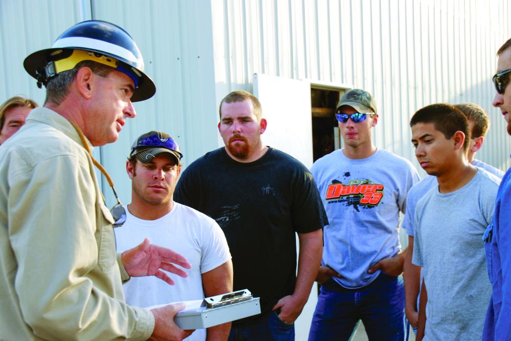 LCSC Director Larry Detwiler speaks to students at a hot line school.